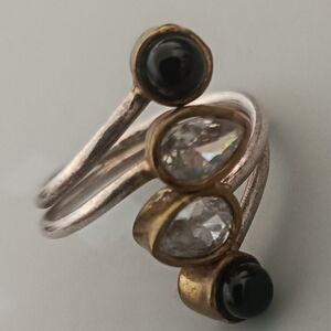 Elegant Gold and Silver Ring with Black Accents